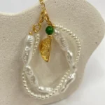Pulseira de Pérola Pequena e Palito e Detalhe de Meia Laranja