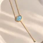 Colar ouro com Pedra Azul Translúcida